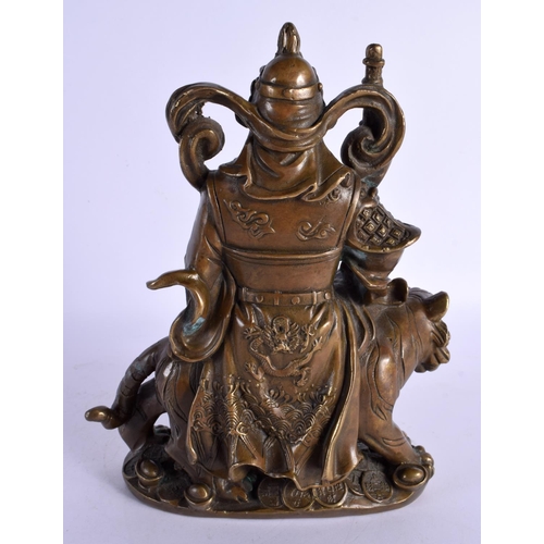 314 - A CHINESE BRONZE FIGURE OF A GUARDIAN 20th Century. 23 cm x 13 cm.