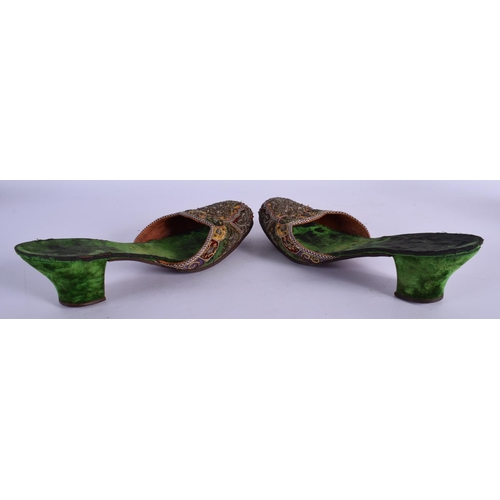 320 - A PAIR OF 18TH CENTURY BEADWORK SLIPPERS decorated with foliage. 24 cm long.