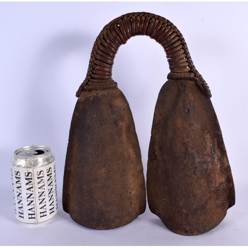 326 - AN UNUSUAL TRIBAL IRON BELL. 32 cm x 24 cm.