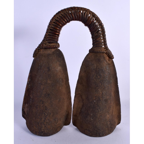 326 - AN UNUSUAL TRIBAL IRON BELL. 32 cm x 24 cm.