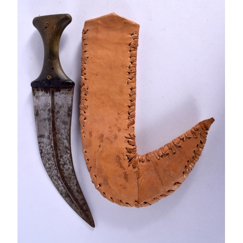 328 - AN ANTIQUE OMANI CARVED RHINOCEROS HORN JAMBIYA DAGGER. 32 cm wide.