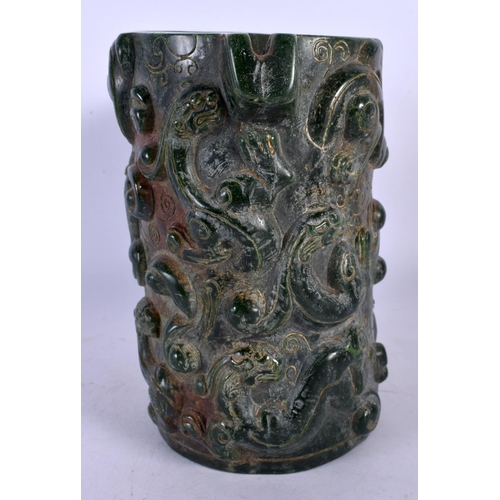 331 - A CHINESE CARVED JADE TYPE JUG 20th Century. 17 cm high.