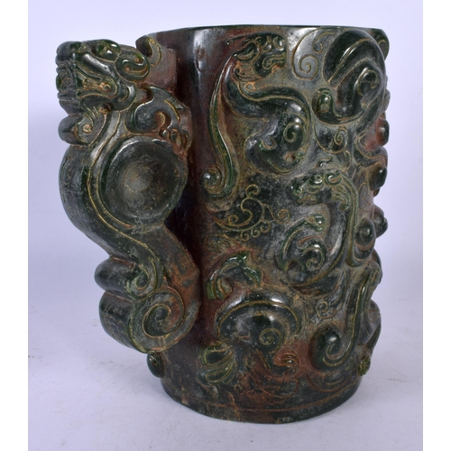 331 - A CHINESE CARVED JADE TYPE JUG 20th Century. 17 cm high.