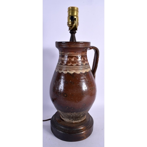 333 - AN ANTIQUE SLIP DECORATED POTTERY LAMP. 41 cm high.