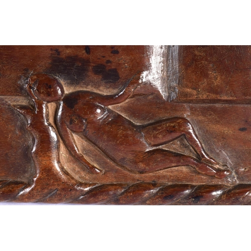 339 - AN 18TH/19TH CENTURY EUROPEAN CARVED FRUITWOOD PANEL depicting figures within an interior. 40 cm x 1... 