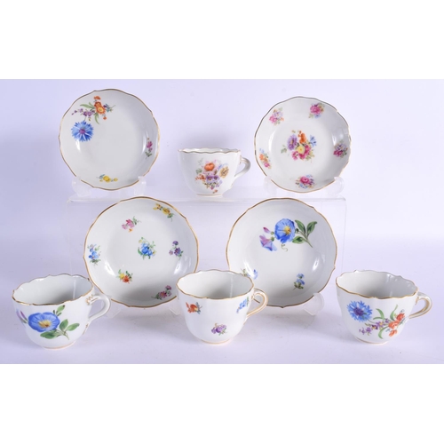 34 - FOUR MEISSEN PORCELAIN CUPS AND SAUCERS painted with flowers. 10 cm wide. (8)