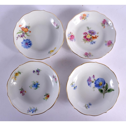 34 - FOUR MEISSEN PORCELAIN CUPS AND SAUCERS painted with flowers. 10 cm wide. (8)