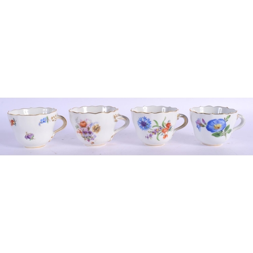 34 - FOUR MEISSEN PORCELAIN CUPS AND SAUCERS painted with flowers. 10 cm wide. (8)