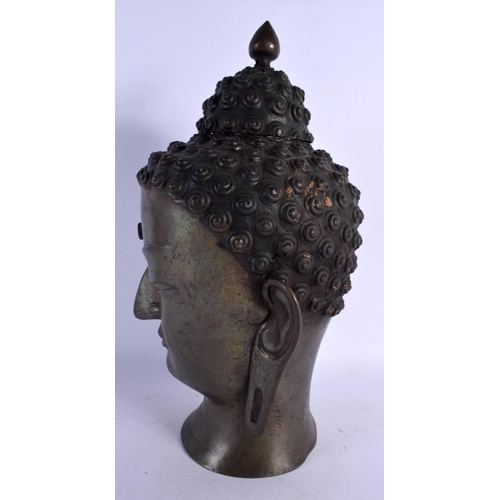 347 - A LARGE 19TH CENTURY CHINESE BRONZE BUDDHA HEAD with moonstone inlay. 38 cm x 14 cm.