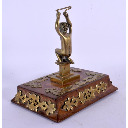 362 - A VICTORIAN BURR WALNUT AND BRASS MOUNTED DESK STAND possibly a watch holder. 12 cm x 15 cm.