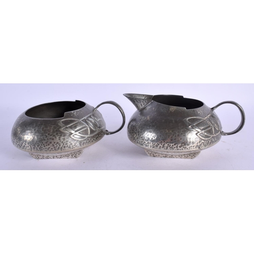 373 - AN ARTS AND CRAFTS STYLE ENGLISH PEWTER TEASET with tray, decorated with scrolling foliage. Largest ... 