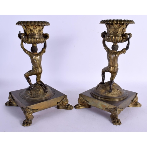 376 - A PAIR OF EARLY 19TH CENTURY FRENCH NUBIAN FIGURAL COMPORT STANDS modelled upon paw feet. 24 cm x 10... 