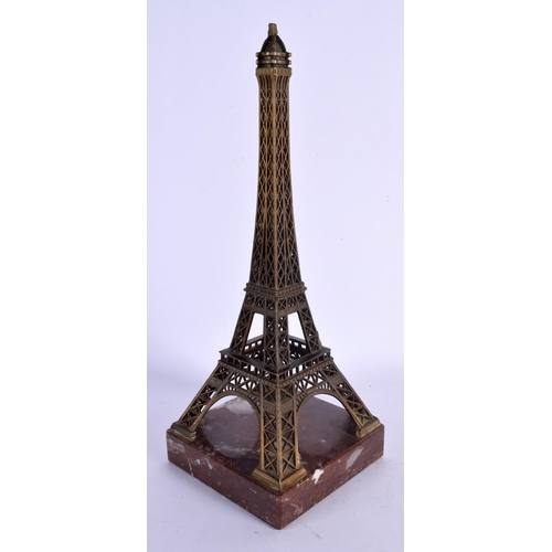 377 - AN UNUSUAL EARLY 20TH CENTURY FRENCH GILT METAL AND MARBLE MODEL formed as the Eiffel tower. 27 cm h... 