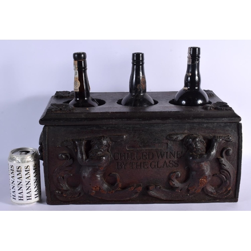 378 - AN UNUSUAL SHIPS CHILLED WINE BY THE GLASS DECANTER BOX decorated with mythical men. 40 cm x 24 cm.