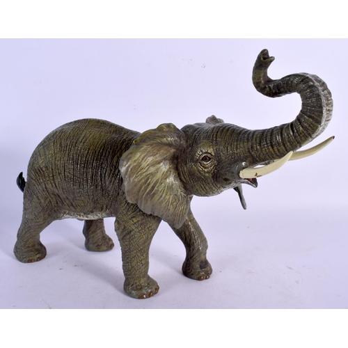 384 - A LARGE CONTEMPORARY COLD PAINTED BRONZE ELEPHANT. 30 cm x 22 cm.