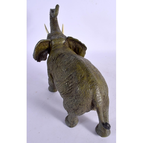 384 - A LARGE CONTEMPORARY COLD PAINTED BRONZE ELEPHANT. 30 cm x 22 cm.