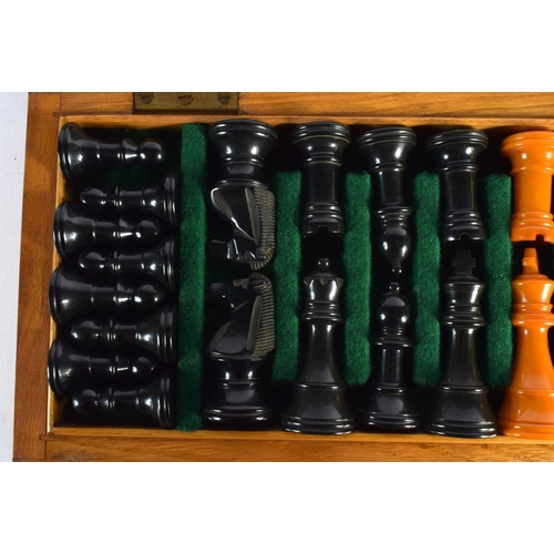 391 - A VERY RARE CASED ART DECO BAKELITE CATALIN CHESS SET within a fitted case. Largest 7.25 cm high. (q... 