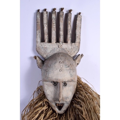 402 - A VINTAGE AFRICAN TRIBAL CARVED WOOD MASK. Mask 40 cm x 22 cm.