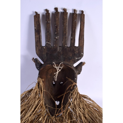 402 - A VINTAGE AFRICAN TRIBAL CARVED WOOD MASK. Mask 40 cm x 22 cm.