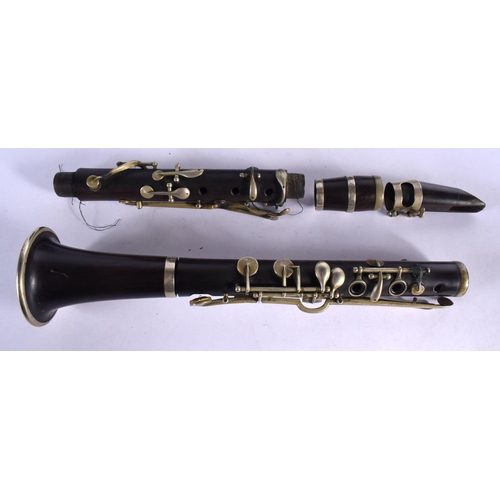 408 - A LOVELY ANTIQUE CARVED WOOD CLARINET within a George III wood case. 66 cm long.