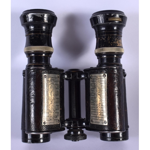 410 - A LOVELY PAIR OF MILITARY RANGE FINDER BINOCULARS inset with plaques of horses. 12 cm x 10 cm.