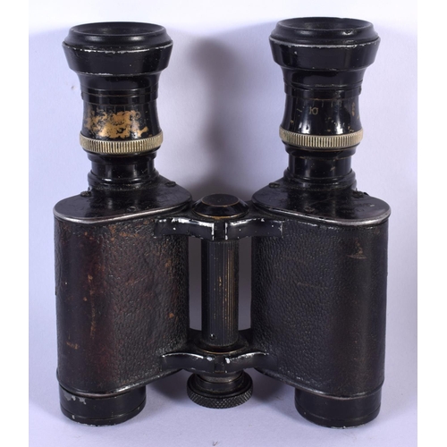 410 - A LOVELY PAIR OF MILITARY RANGE FINDER BINOCULARS inset with plaques of horses. 12 cm x 10 cm.