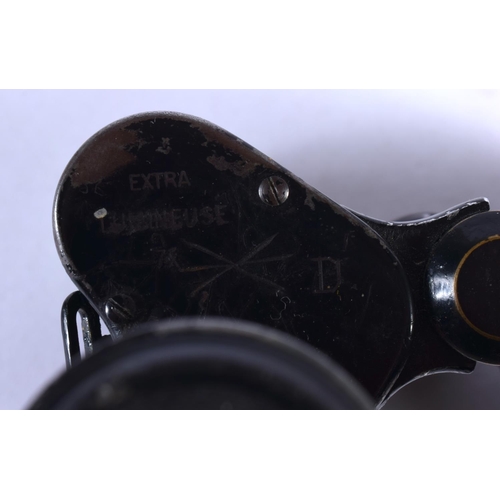 410 - A LOVELY PAIR OF MILITARY RANGE FINDER BINOCULARS inset with plaques of horses. 12 cm x 10 cm.