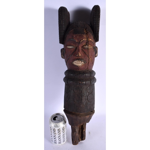 423 - AN AFRICAN TRIBAL CARVED WOOD FIGURAL POST. 50 cm long.