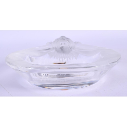 43 - A FRENCH LALIQUE GLASS ASHTRAY formed with a lion. 14 cm diameter.