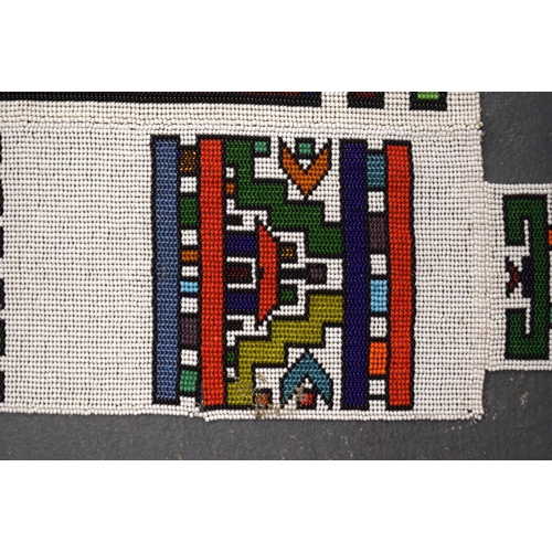 438 - AN AFRICAN BEADWORK TRIBAL SASH. 175 cm x 32 cm.