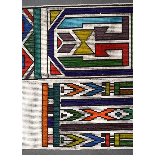 438 - AN AFRICAN BEADWORK TRIBAL SASH. 175 cm x 32 cm.