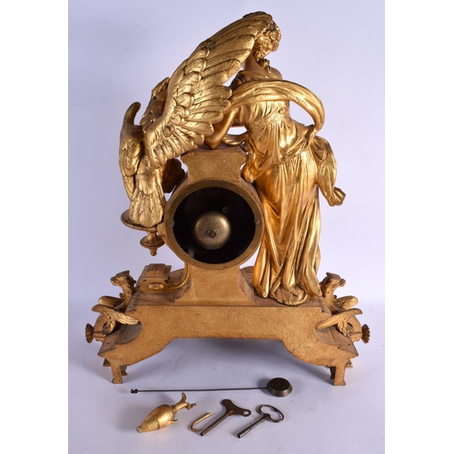 440 - A LARGE 19TH CENTURY FRENCH GILT BRONZE MANTEL CLOCK formed with a figure beside a bird. 54 cm x 28 ... 