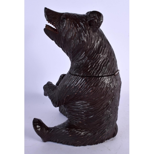 446 - AN EARLY 20TH CENTURY BAVARIAN BLACK FOREST BEAR TOBACCO JAR. 23.5 cm high.