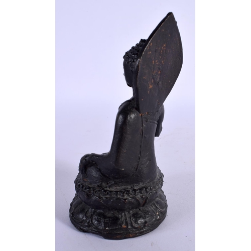 448 - AN INDIAN THAI FIGURE OF A BUDDHA. 15 cm high.