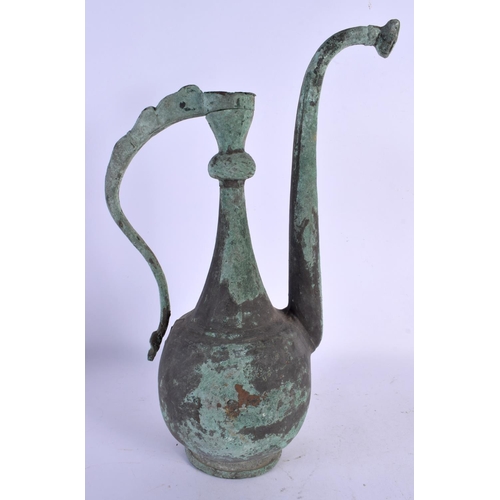 449 - A LARGE MIDDLE EASTERN BRONZE EWER. 36 cm x 14 cm.