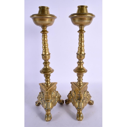 450 - A LARGE PAIR OF 18TH CENTURY CONTINENTAL BRONZE CANDLESTICKS. 41 cm high.