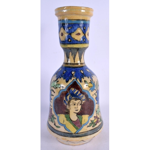 461 - A MIDDLE EASTERN FAIENCE POTTERY HOOKAH PIPE BASE painted with portraits. 29 cm high.