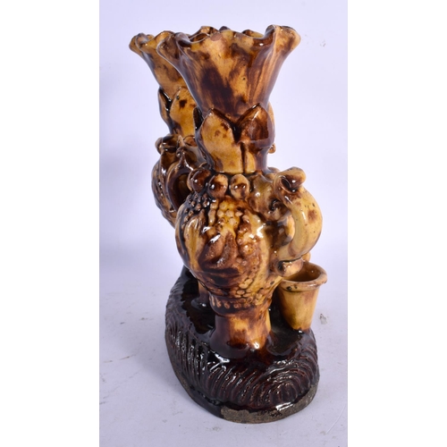 463 - A TURKISH MIDDLE EASTERN CANAKKALE POTTERY VASE STAND of naturalistic form. 23 cm x 18 cm.