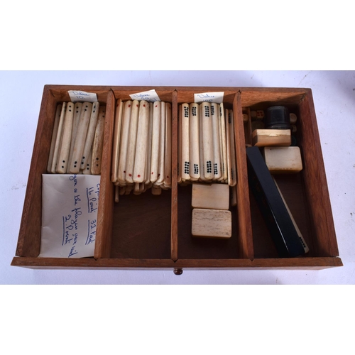 465 - AN EARLY 20TH CENTURY CHINESE CARVED BONE MAHJONG SET. 25 cm x 18 cm.