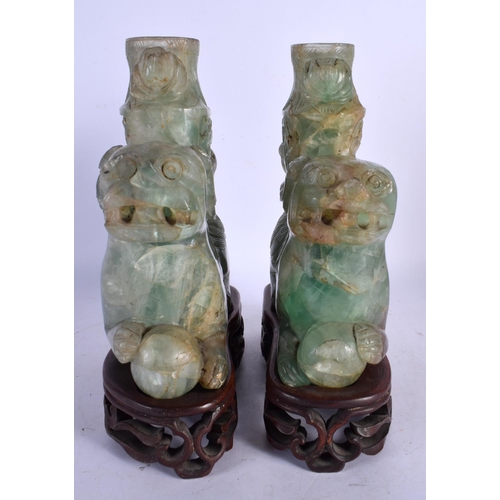 470 - A LARGE PAIR OF 19TH CENTURY CHINESE GREEN QUARTZ STONE FIGURES modelled as buddhistic lions. 24 cm ... 