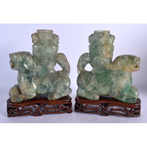 470 - A LARGE PAIR OF 19TH CENTURY CHINESE GREEN QUARTZ STONE FIGURES modelled as buddhistic lions. 24 cm ... 