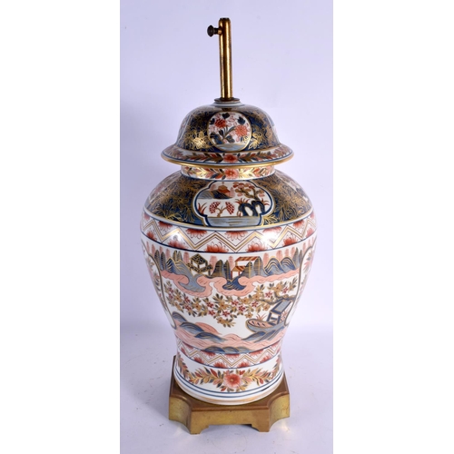 484 - A LARGE LATE 19TH CENTURY FRENCH SAMSONS OF PARIS PORCELAIN LAMP painted with foliage. 53 cm high.