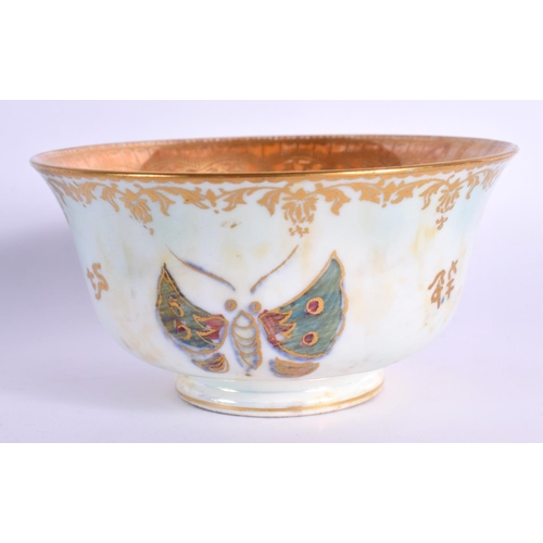 49 - A WEDGWOOD LUSTRE PORCELAIN BOWL painted with butterflies. 8.5 cm diameter.