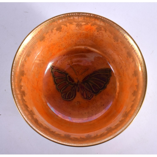 49 - A WEDGWOOD LUSTRE PORCELAIN BOWL painted with butterflies. 8.5 cm diameter.