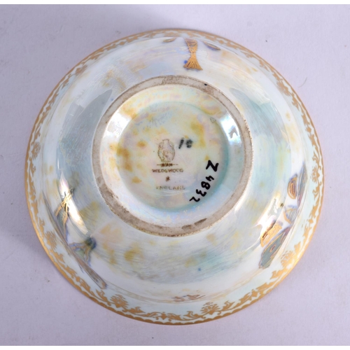 49 - A WEDGWOOD LUSTRE PORCELAIN BOWL painted with butterflies. 8.5 cm diameter.