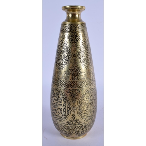 491 - AN 18TH CENTURY ISLAMIC MIDDLE EASTERN BRONZE VASE decorated with Kufic script. 20 cm high.