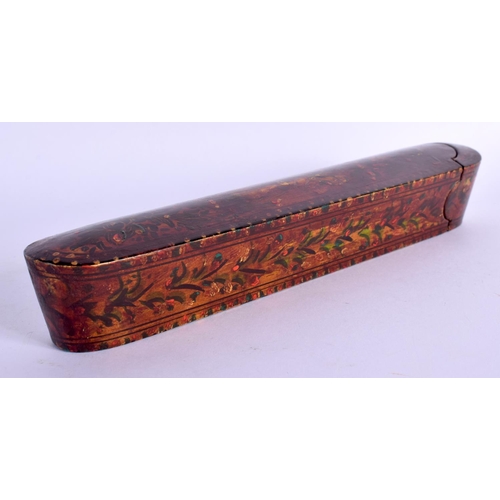 498 - AN ANTIQUE PERSIAN PAPER MACHE SLIDING PEN BOX. 19 cm long.