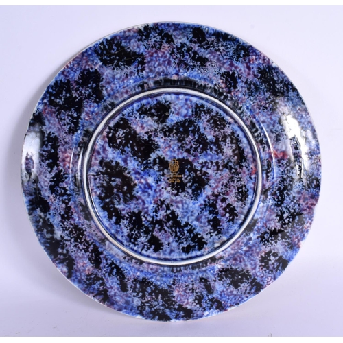 50 - A LARGE WEDGWOOD FAIRYLAND LUSTRE PORCELAIN PLATE by Daisy Makeig Jones. 22 cm diameter.