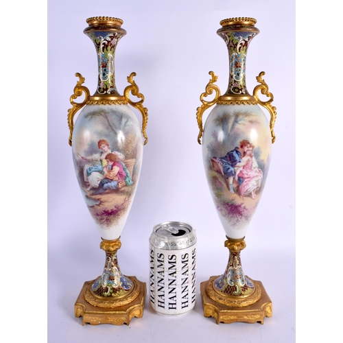 53 - A LARGE LATE 19TH CENTURY FRENCH SEVRES PORCELAIN VASES with champleve enamel mounts. 39 cm high.