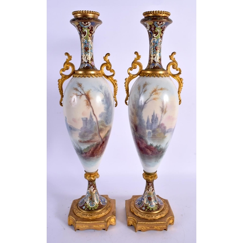 53 - A LARGE LATE 19TH CENTURY FRENCH SEVRES PORCELAIN VASES with champleve enamel mounts. 39 cm high.